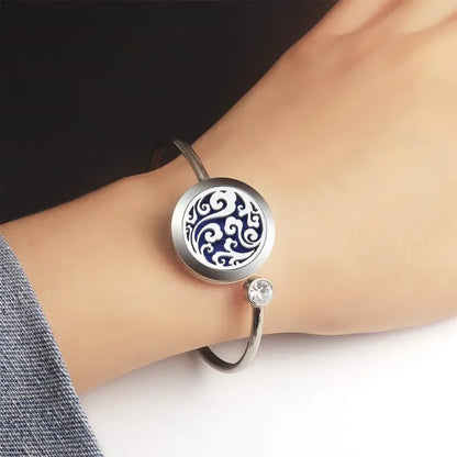 Bracelet avec médaillon diffuseur d'huiles essentielles, en acier inoxydable